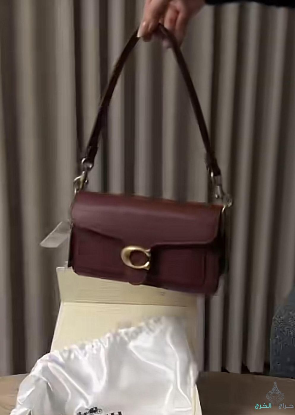 شنطة كوتش برغندي